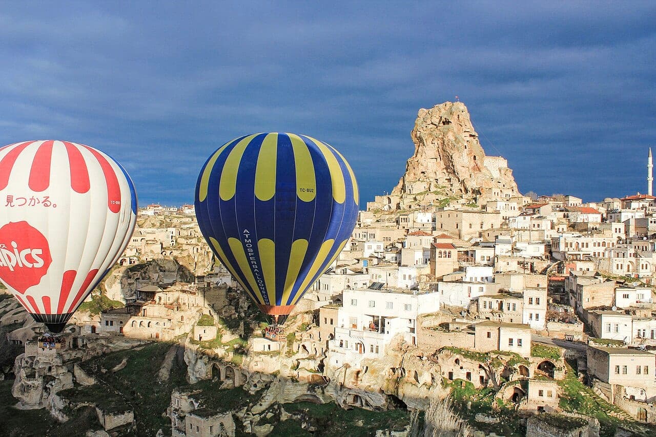 Hot-air balloons over the rock landscape of Cappadocia, Turkey