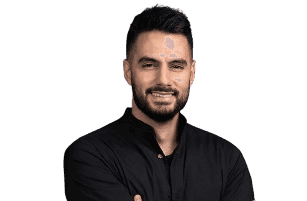 The image features a man with short black hair and a well-groomed beard, wearing a black button-up shirt with a slight smile. He has a confident and friendly expression, with his arms crossed.