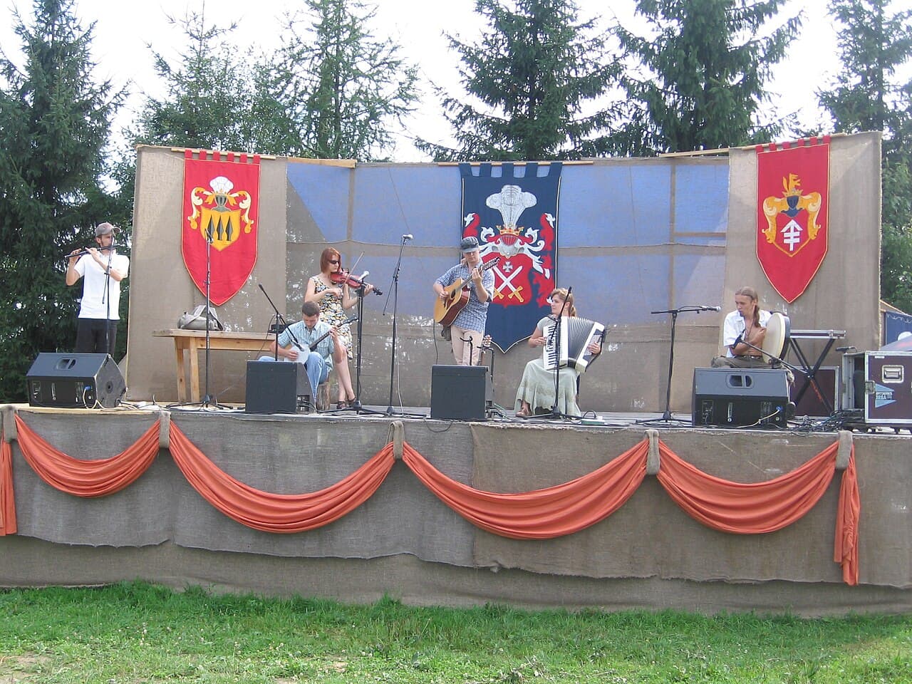 Musicians playing at a Scottish ceilidh