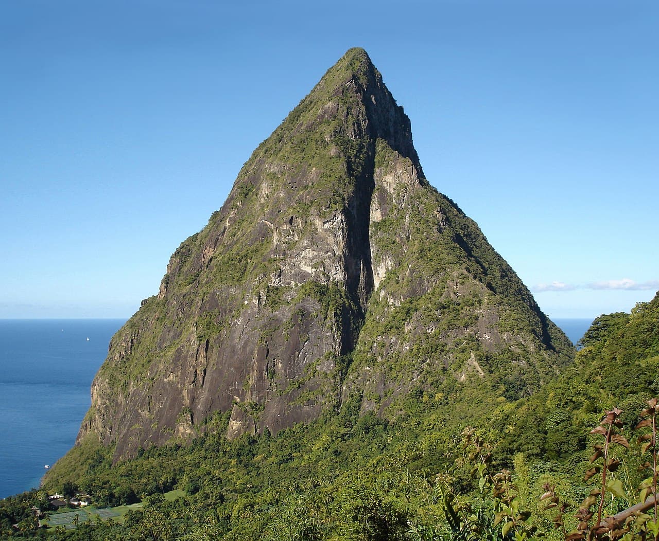 The volcanic spire of Petit Piton rising from the sea